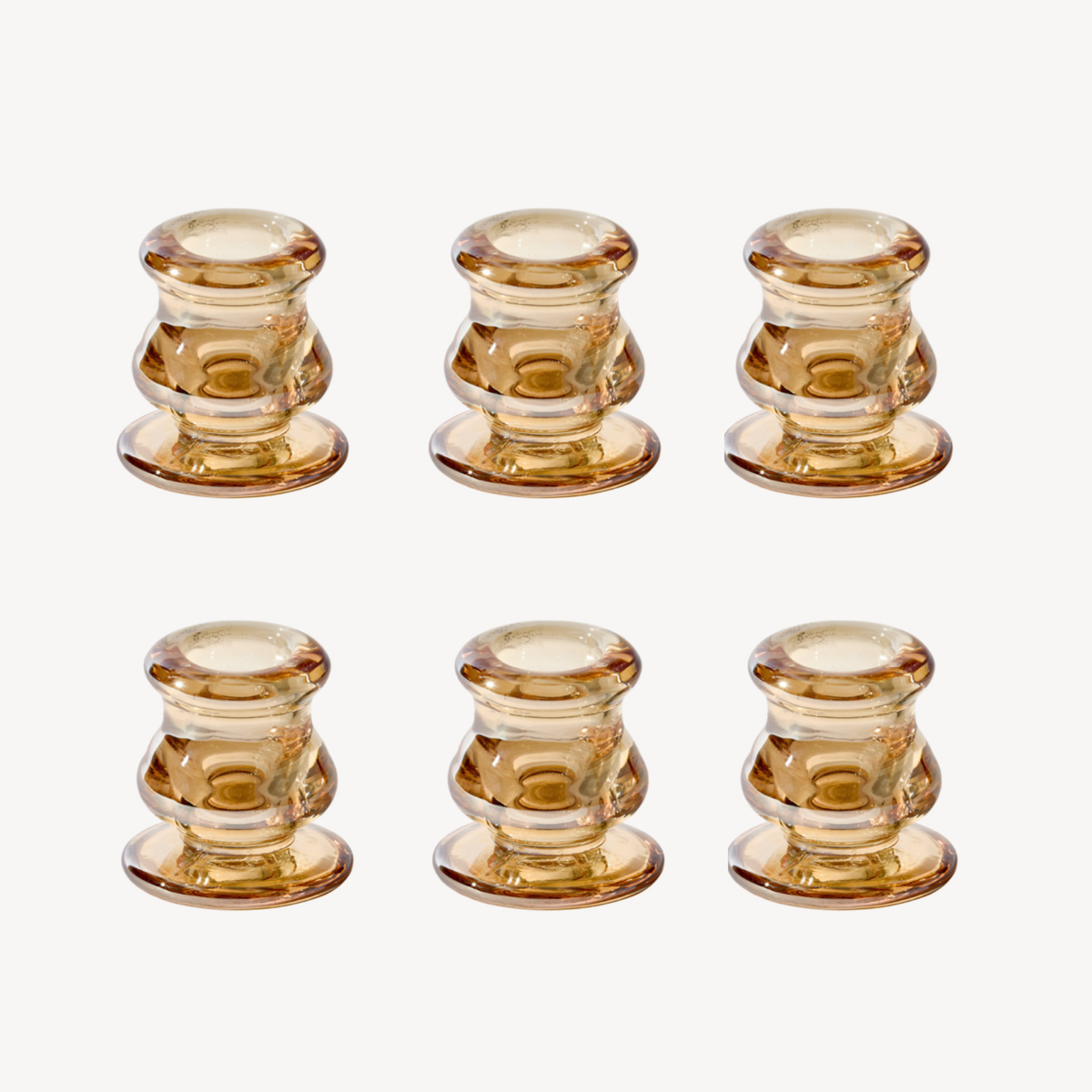 Set of six low amber glass taper candle holders by Candle Flair